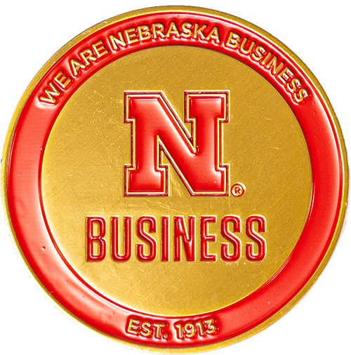 front side of the dean's coin